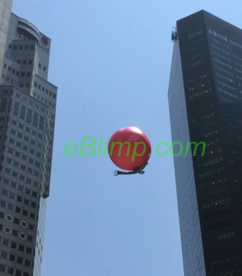 flying evian sphere spinning over singapore rc remote control blimp